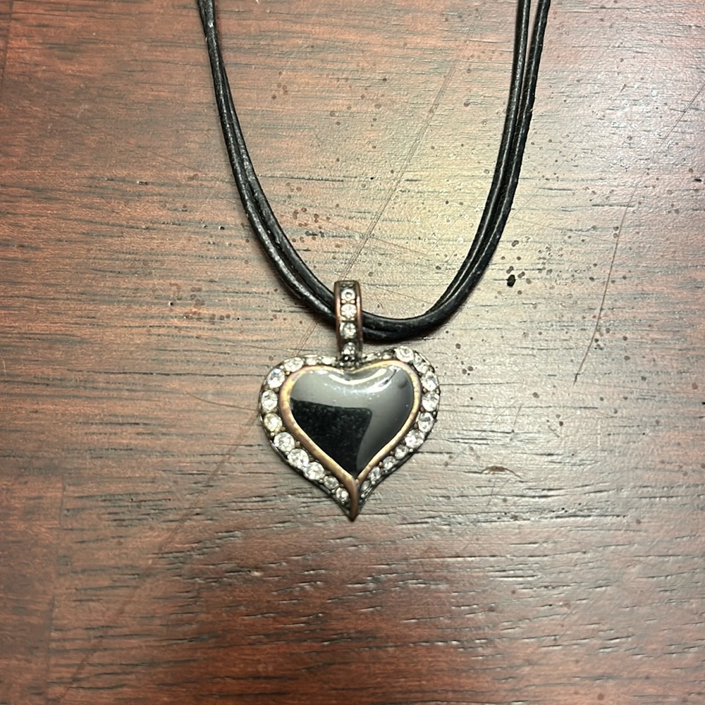 Premiere Design black heart necklace . Leather